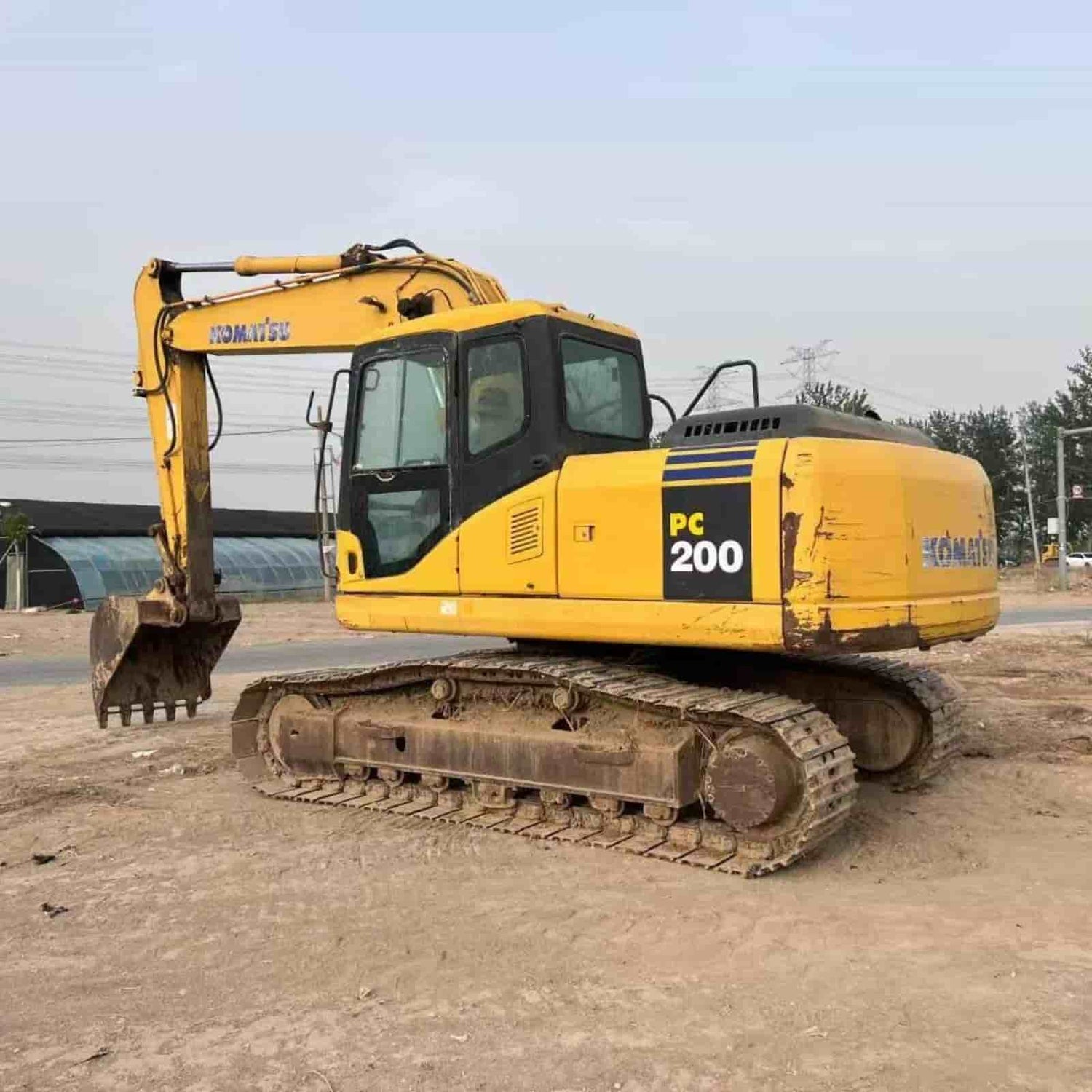How a Nigerian Construction Firm Saved 40% on Roadwork Costs with Used Excavators
